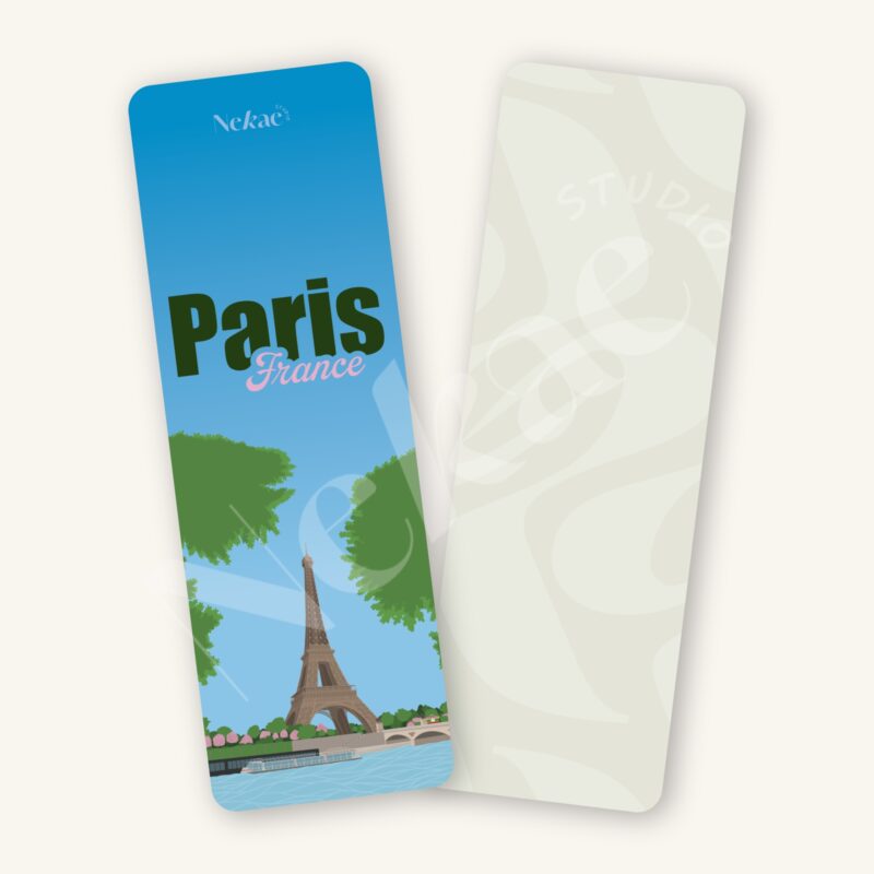 Marque-page illustré de la Tour Eiffel à Paris présenté sur un fond beige